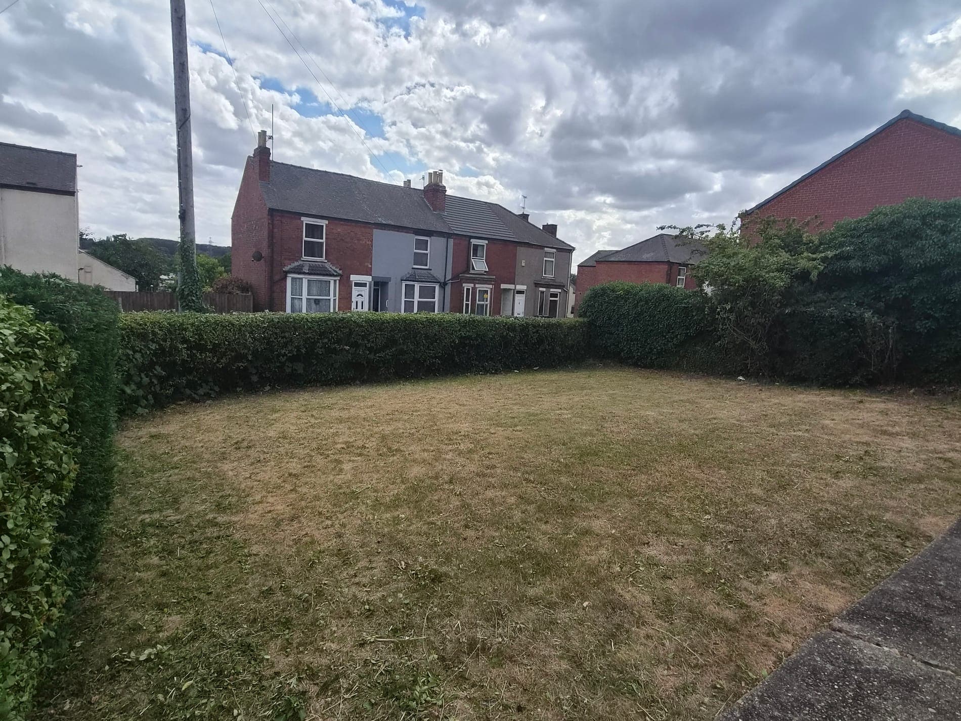 First cut of an overgrown front lawn, Lincoln after Spade & Blade sorted it