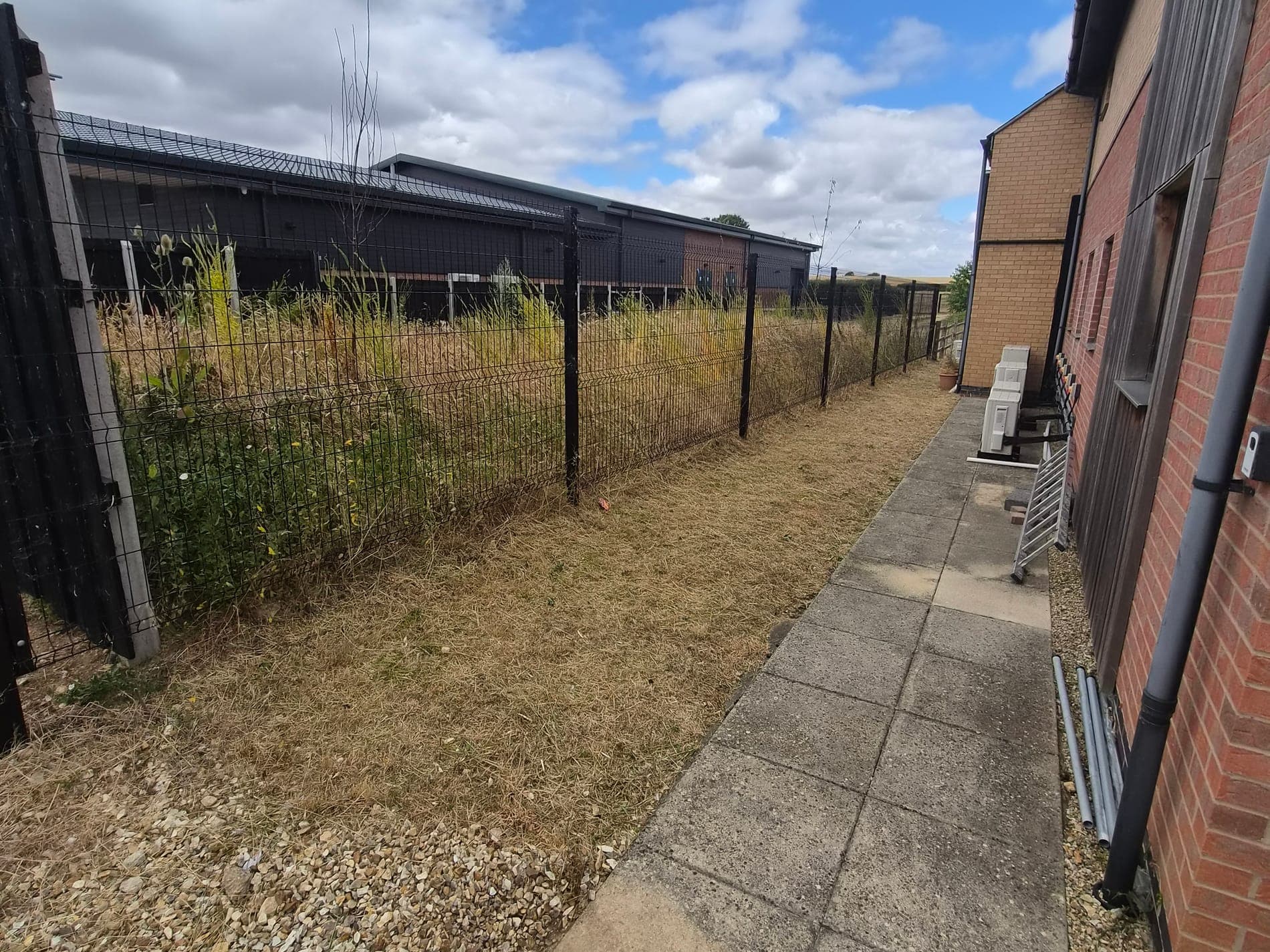 Footpath verges cut back, business premises near Welton after Spade & Blade sorted it