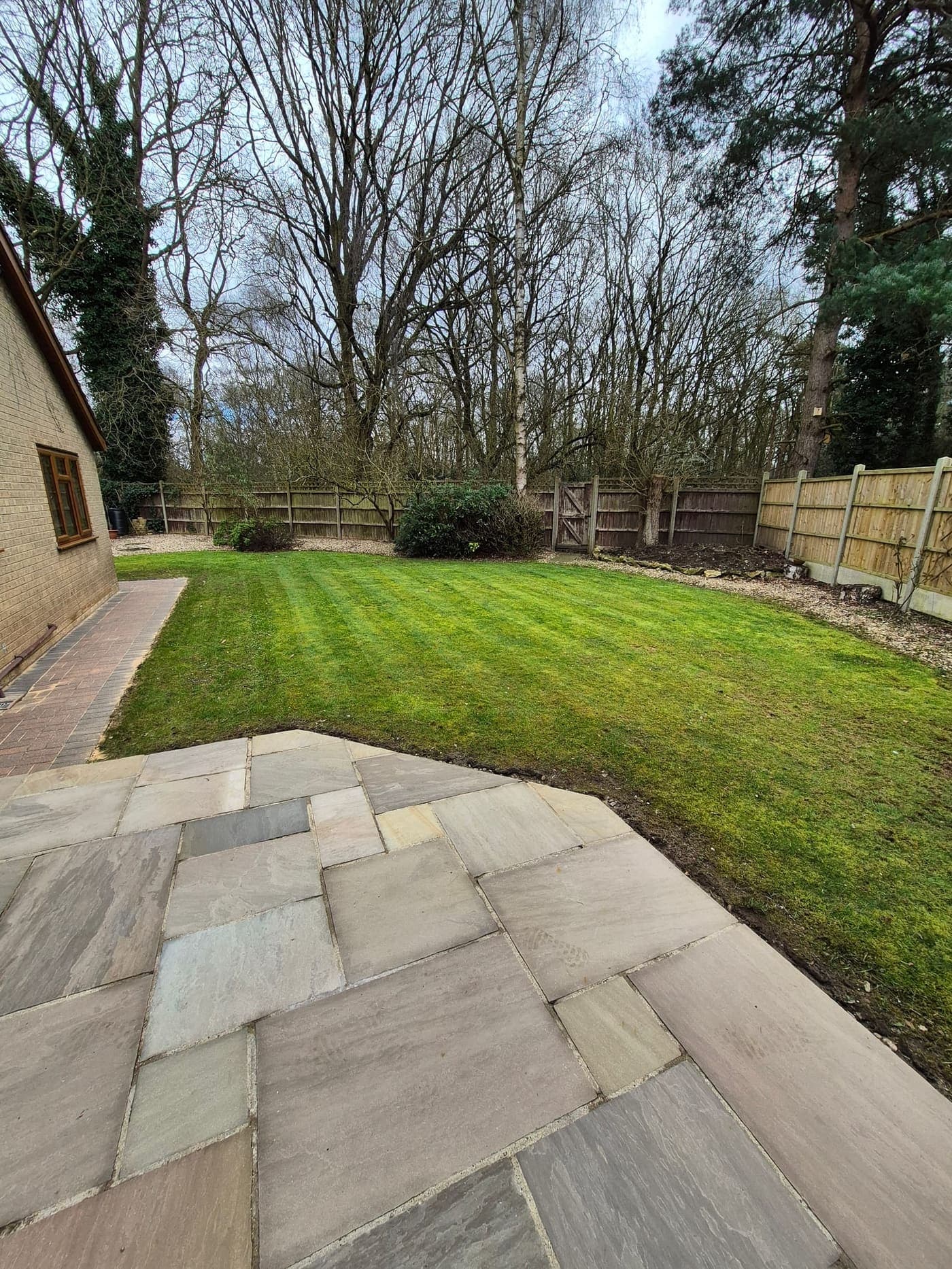 Moss-choked lawn brought back and striped, Birchwood, Lincoln after Spade & Blade sorted it
